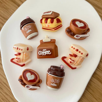 Detalhe de mini ímanes decorativos com tema de café, textura e acabamento